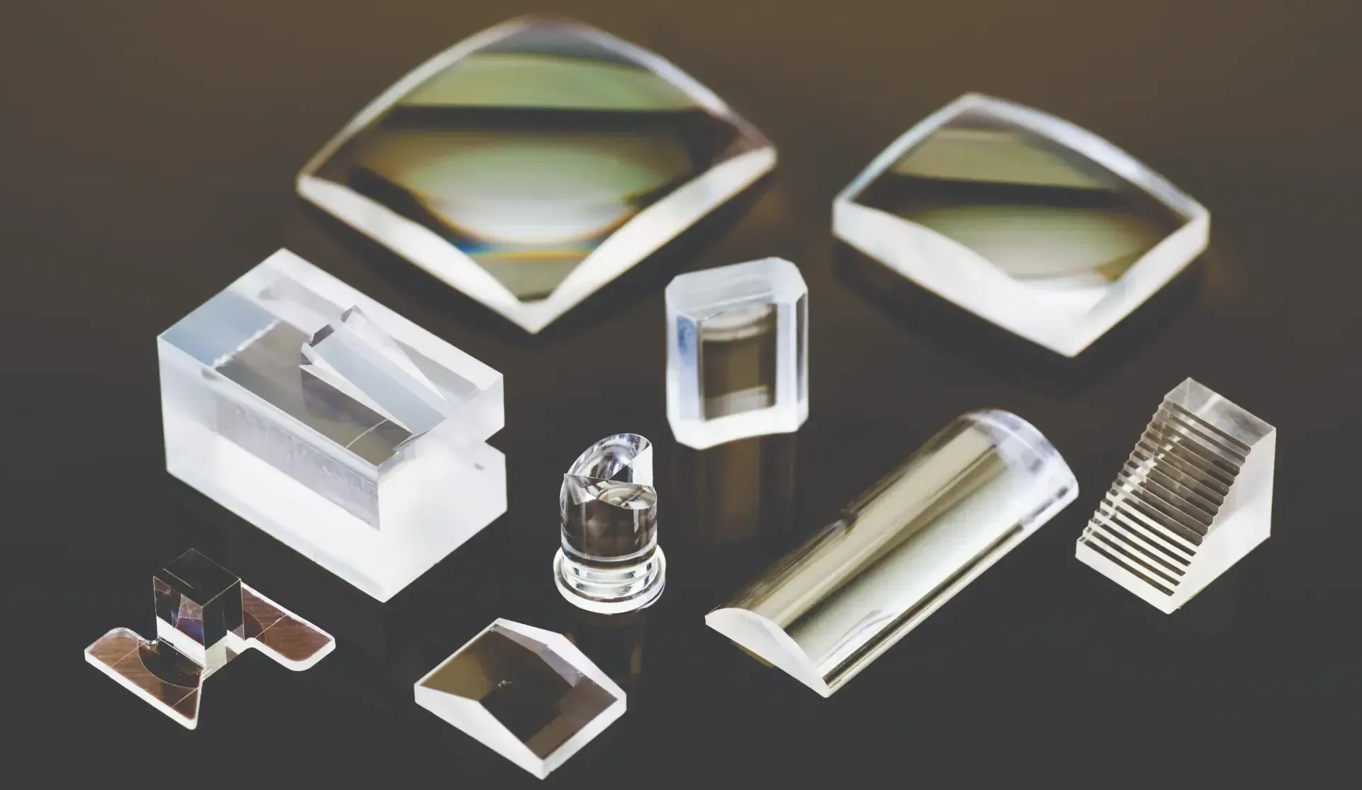 A bunch of different types of lenses are sitting on a table