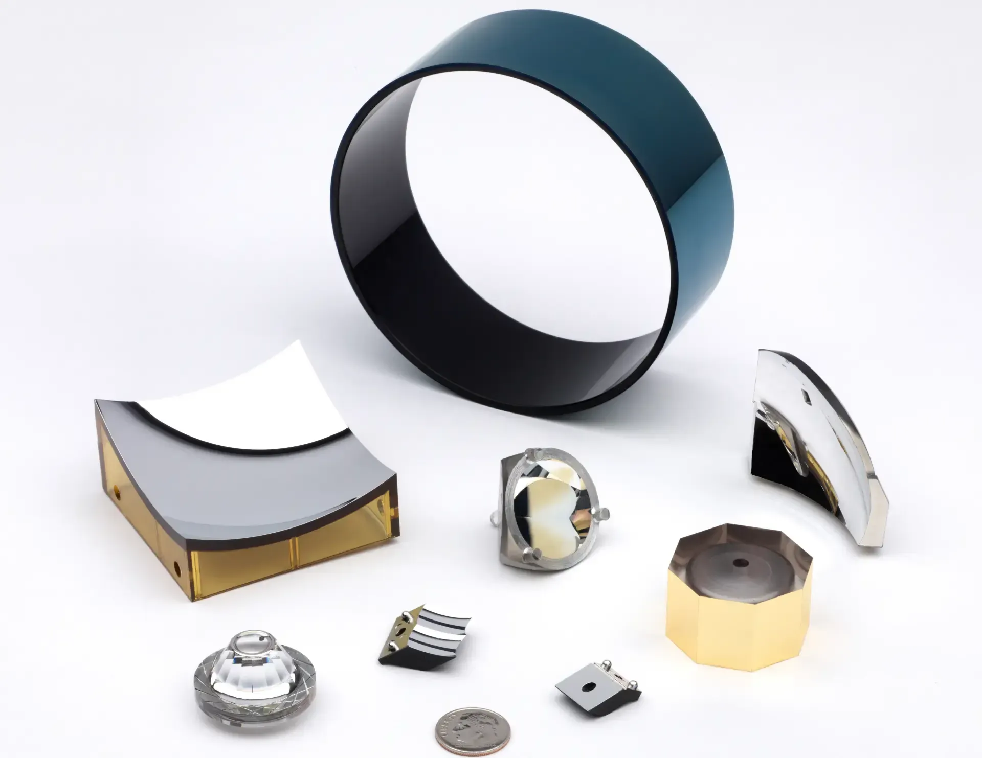 A bunch of different pieces of metal on a white surface