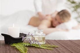 Massage Services - Woman Having a Massage on Bed in Keene, NH