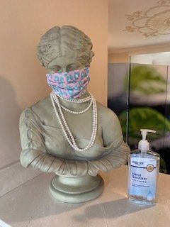 Statue with Face Mask and Alcohol | Keene, NH | Devine Back & Body Care