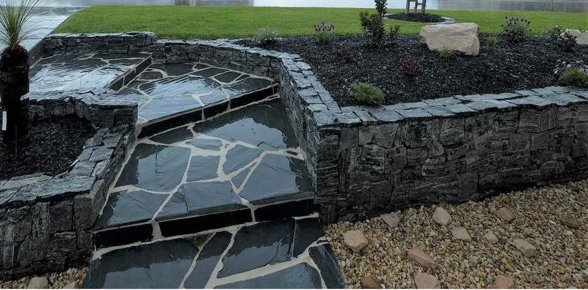 Stone Walkway and Retaining Walls in a Garden — Total Perfection In Avoca Beach, NSW