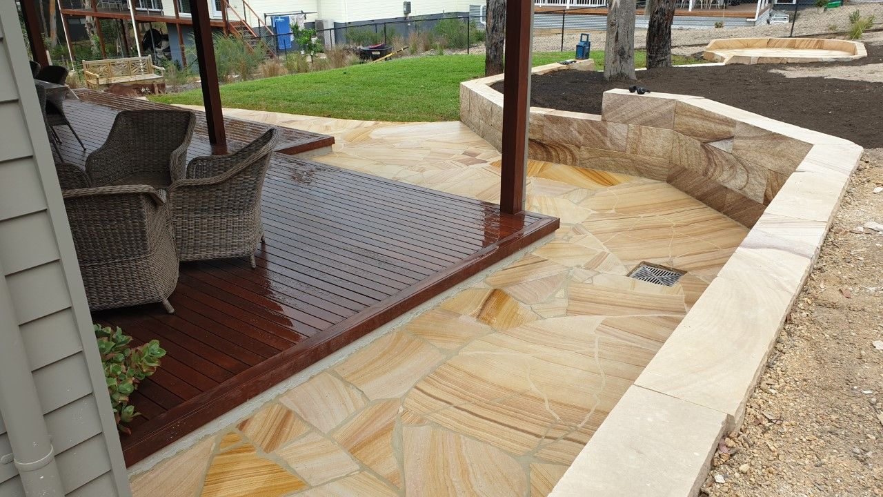 Patio With Brown Sandstone Paving — Total Perfection In Kincumber, NSW