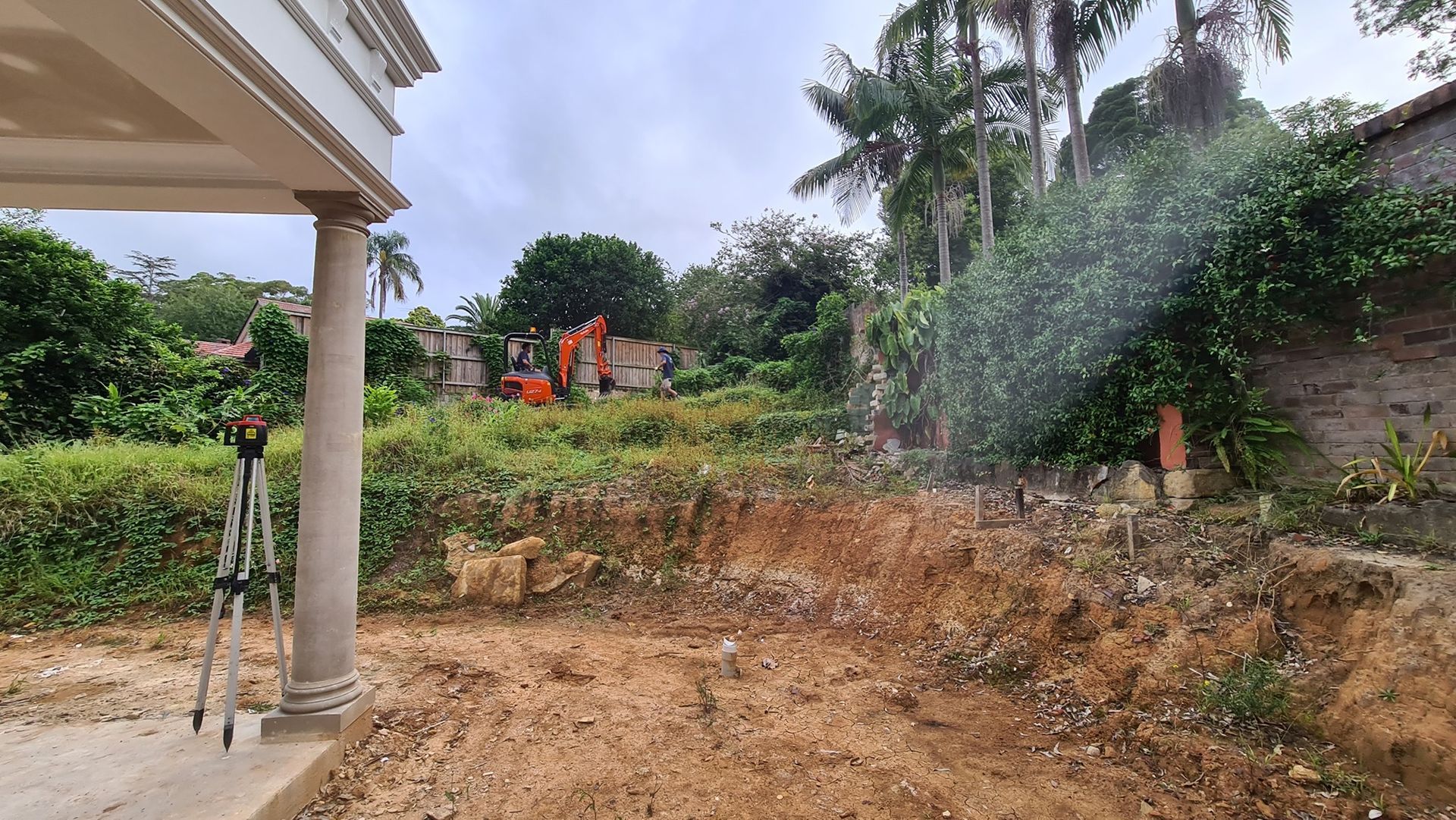 Construction Site With Mini Excavator — Total Perfection In Kariong, NSW