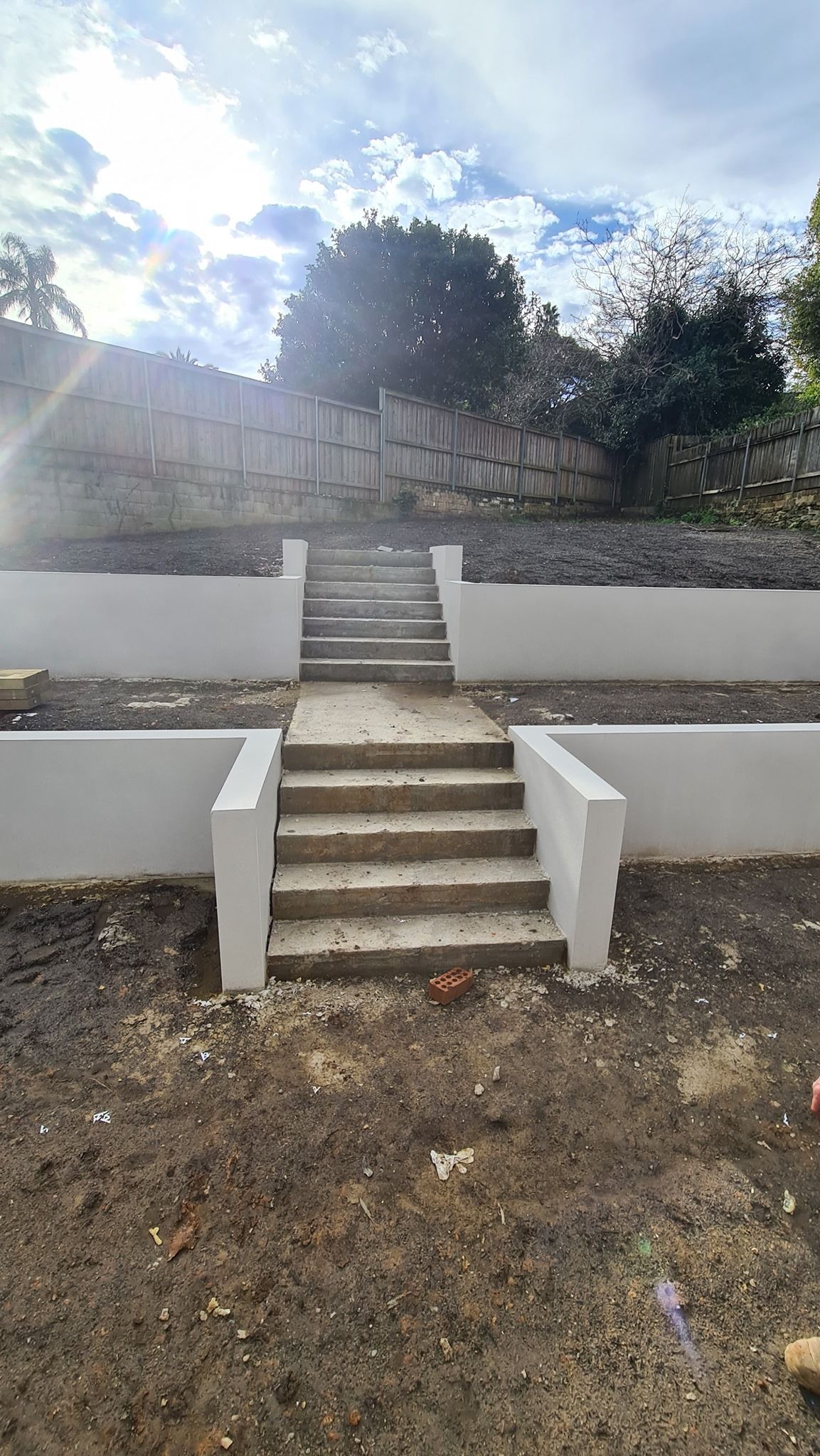 landscape retaining walls with steps in the middle — Total Perfection In Kariong, NSW