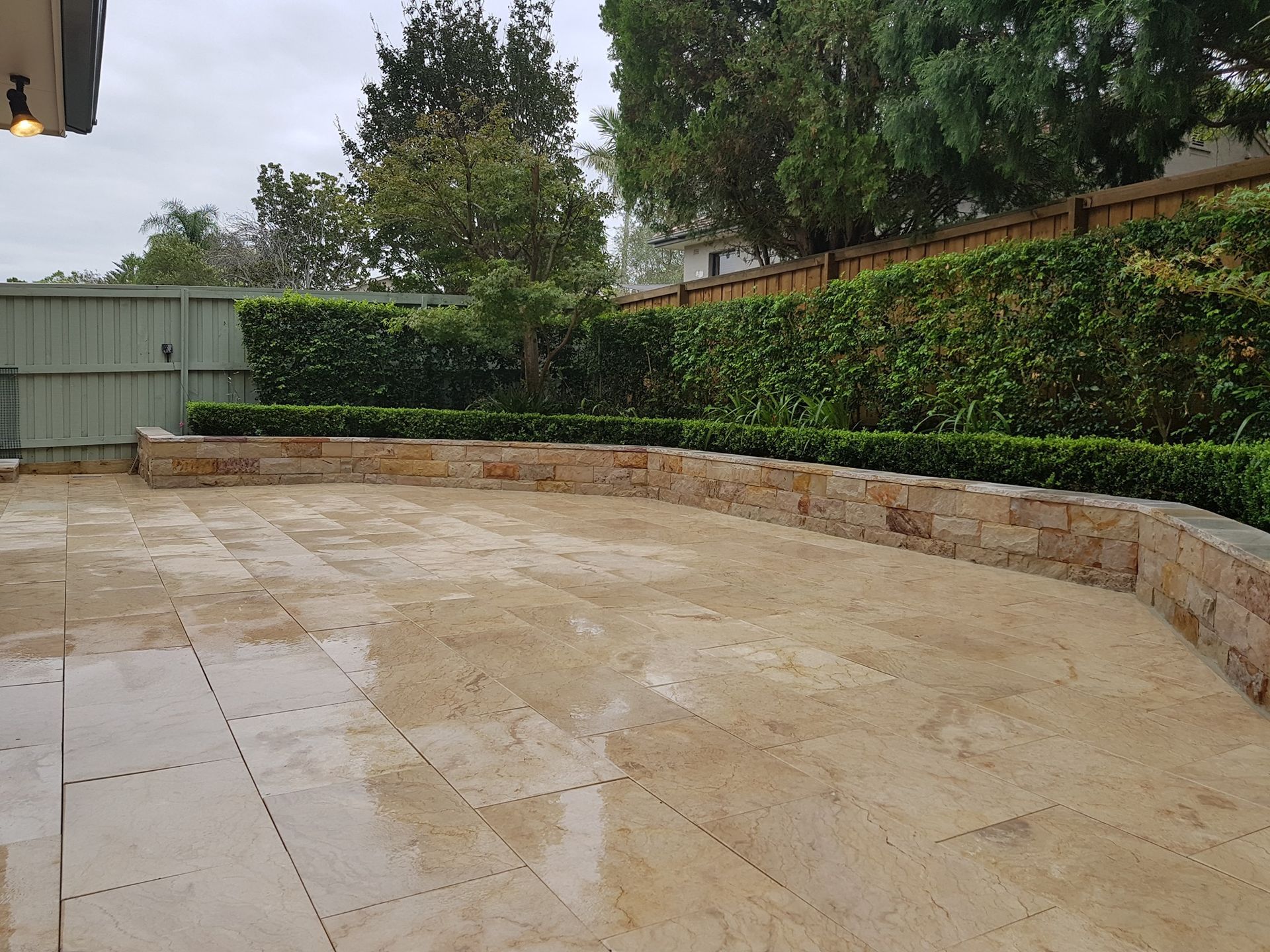 Landscaped Front Yard With a Row of Shrubs and Mulch — Total Perfection In Kariong, NSW