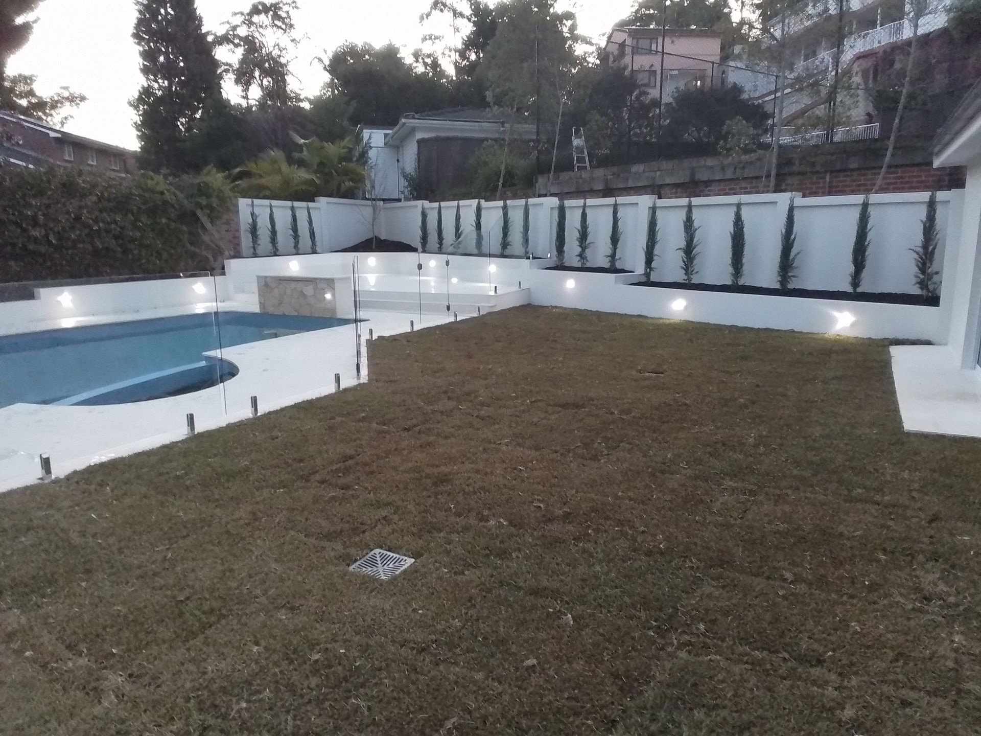 Backyard With a Pool and White Walls — Total Perfection In Gosford, NSW