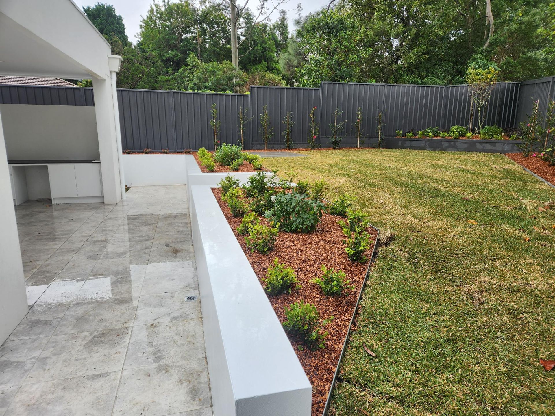 Backyard With a Raised Garden Bed — Total Perfection In Avoca Beach, NSW