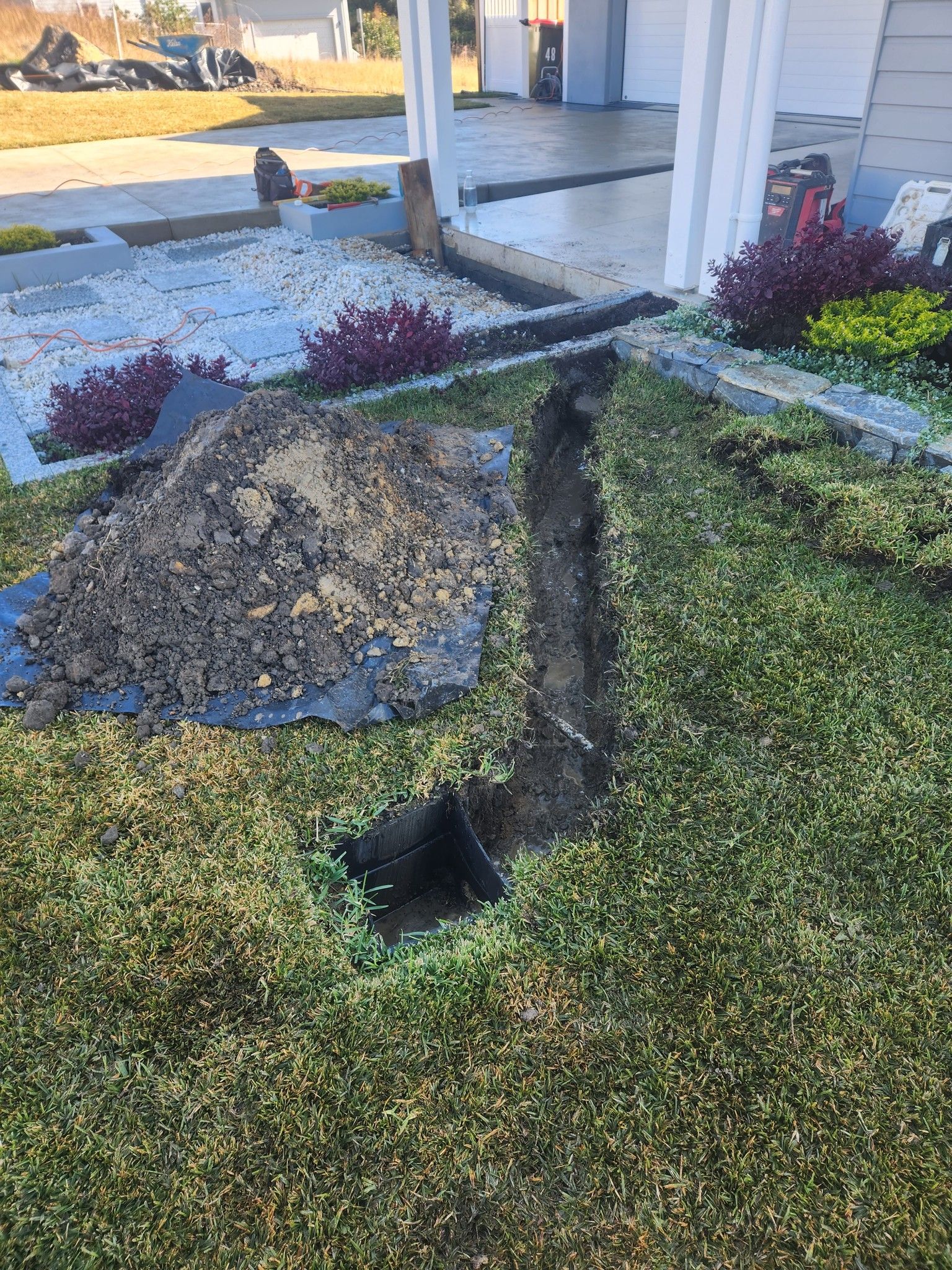 Trench Dug in Grass in Front of a House — Total Perfection In Gosford, NSW