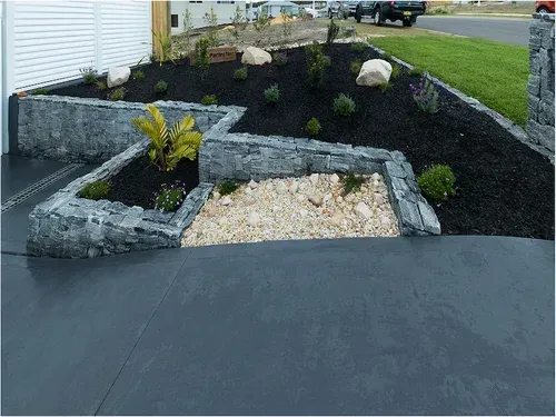 Stone Retaining Walls With Plants and Mulch — Total Perfection In Catherine Hill Bay, NSW