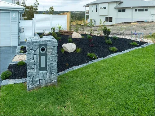 Stone Pillar Mailbox Beside a Manicured Lawn — Total Perfection In Catherine Hill Bay, NSW