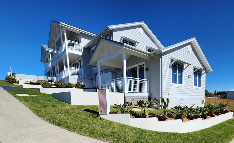 White Multi-storey Building With Balconies — Total Perfection In Catherine Hill Bay, NSW