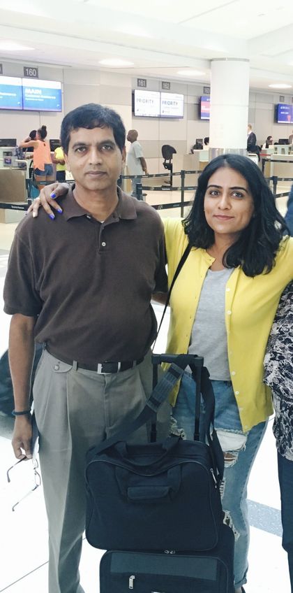 Lahmea with her father in 2019.