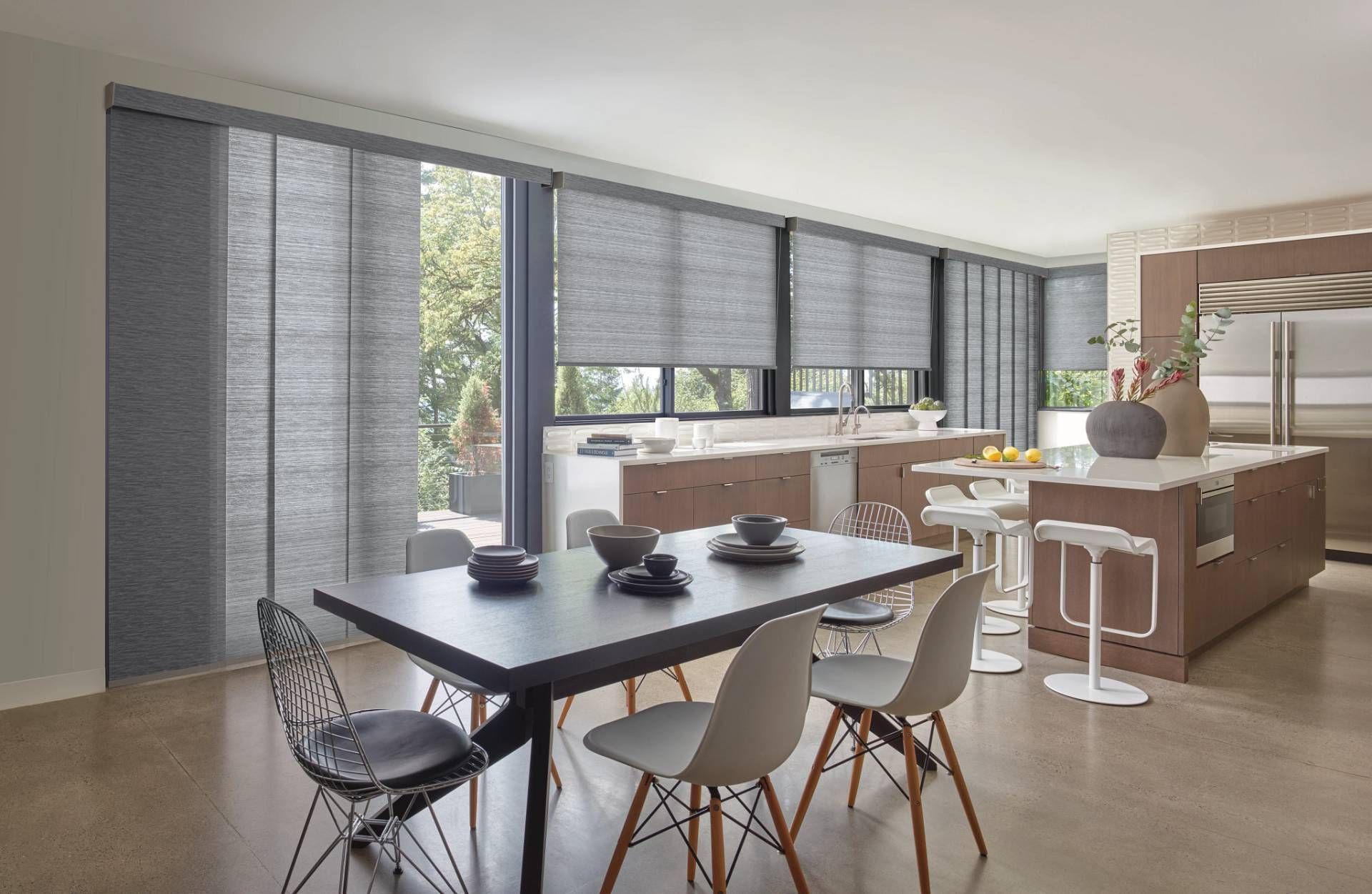 Vertical shades covering large windows in a modern kitchen near St. Louis Park, Woodbury, Burnsville
