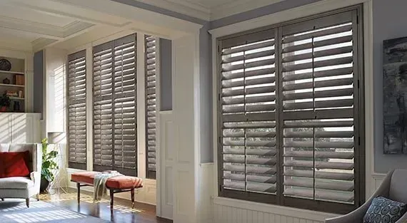 Hunter Douglas Heritance® Hardwood Shutters in a modern living room