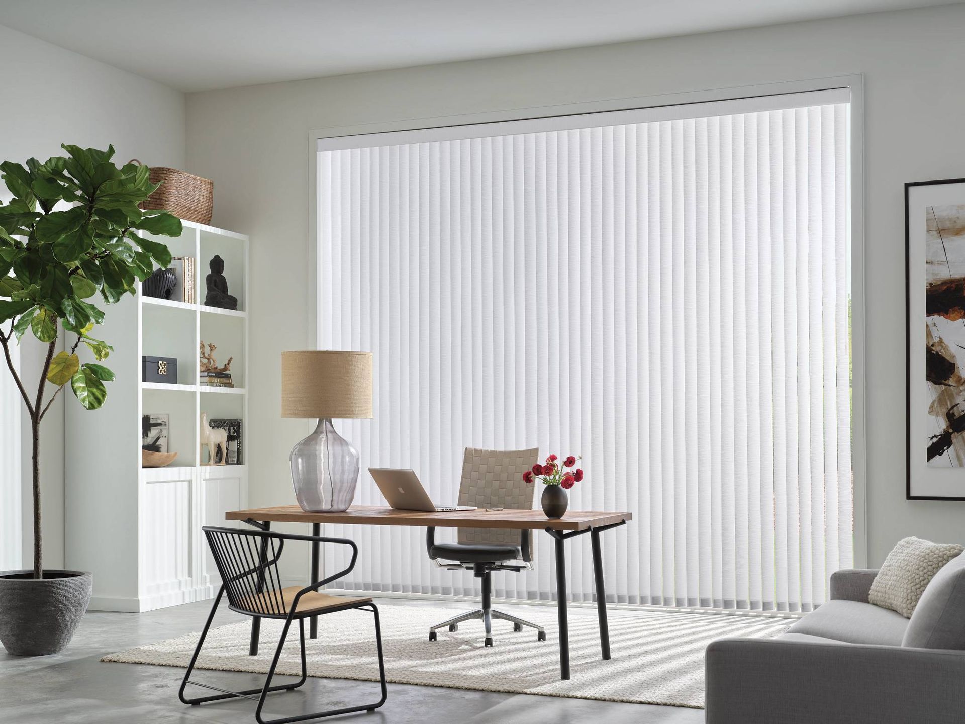 Hunter Douglas vertical blinds in a furnished home office