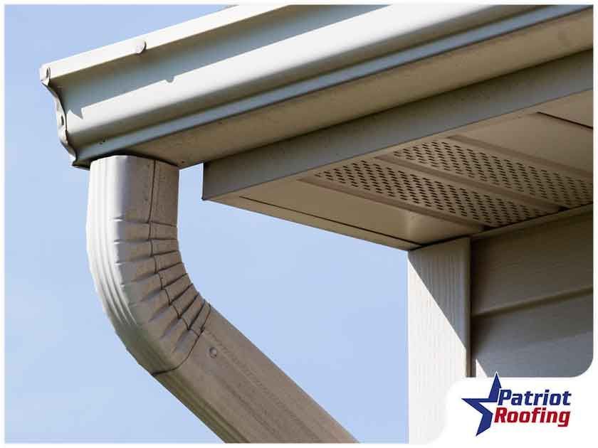 A picture of a gutter on a house taken by patriot roofing
