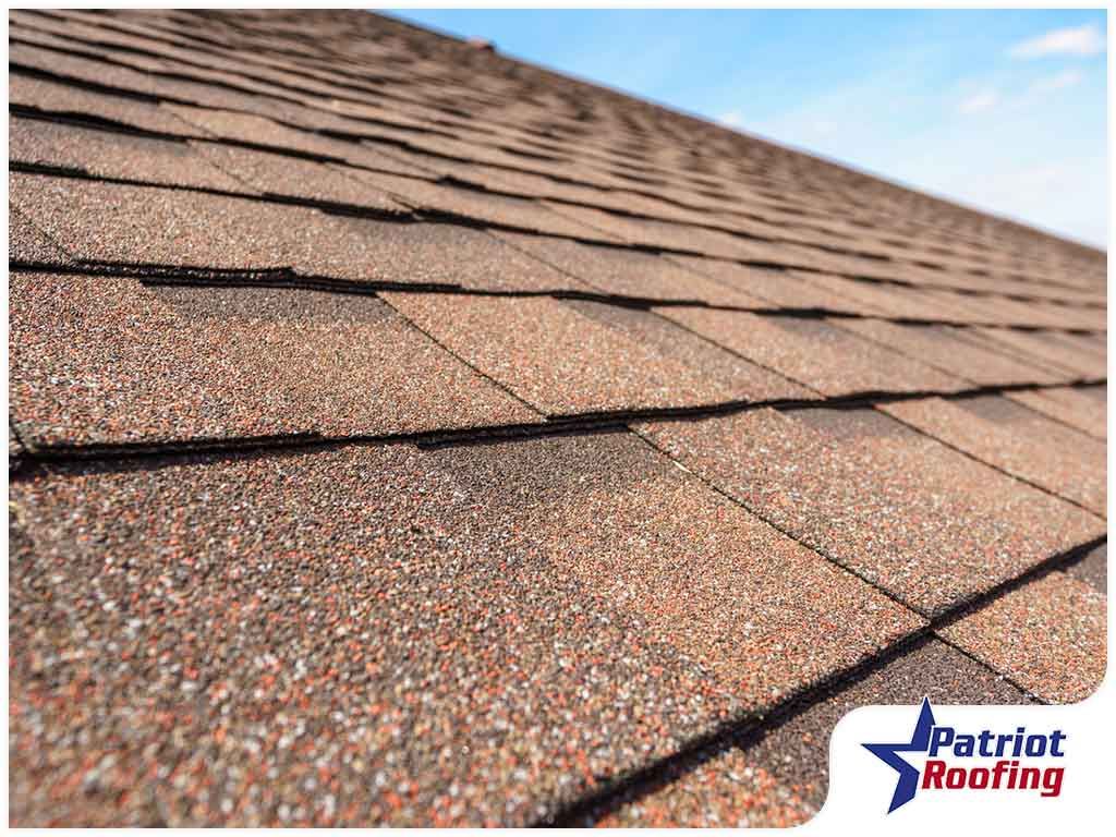 A close up of a roof with shingles on it.