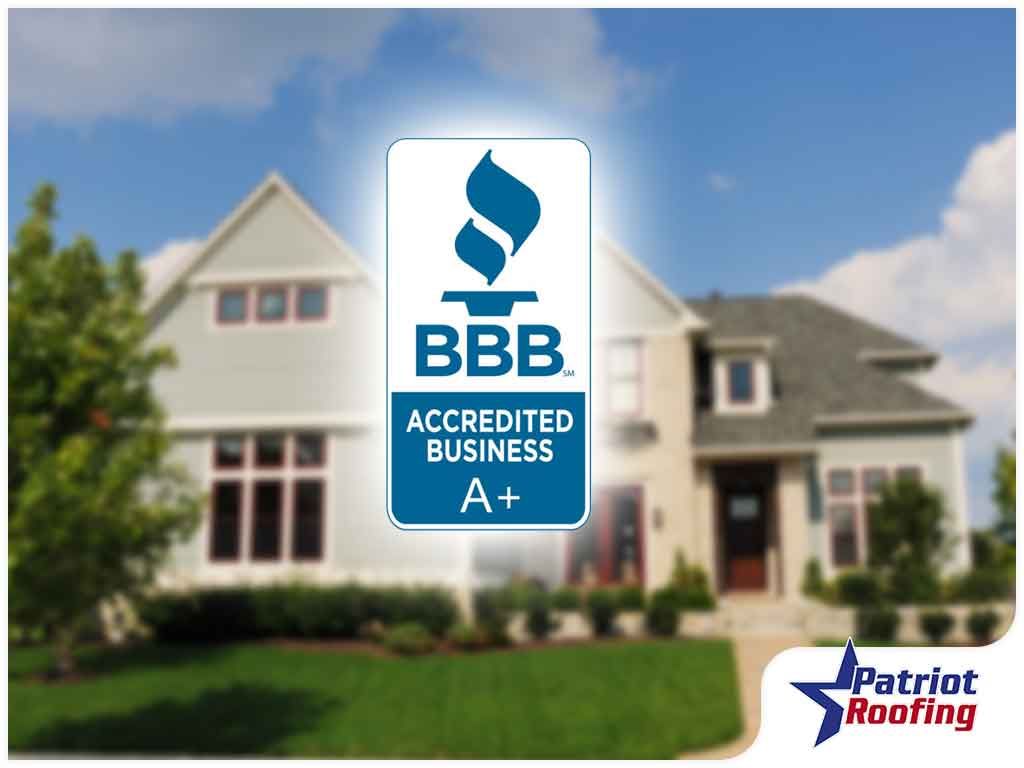A house with a bbb accredited business a+ logo in front of it