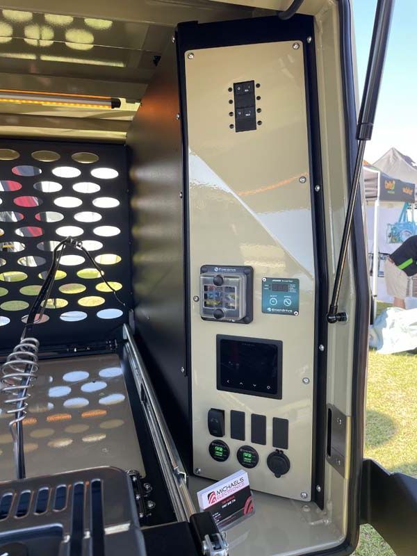 The inside of a vehicle with a bunch of electrical outlets