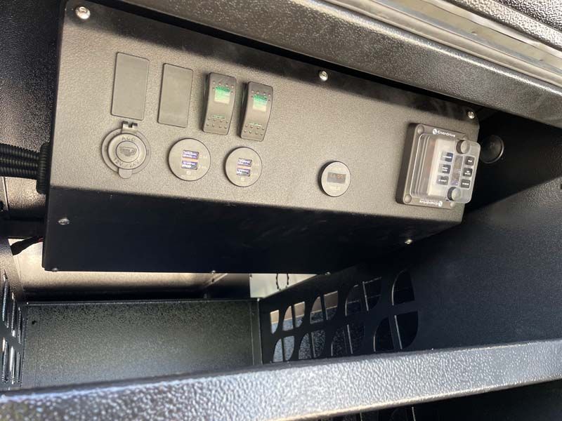 A black box with a bunch of buttons on it