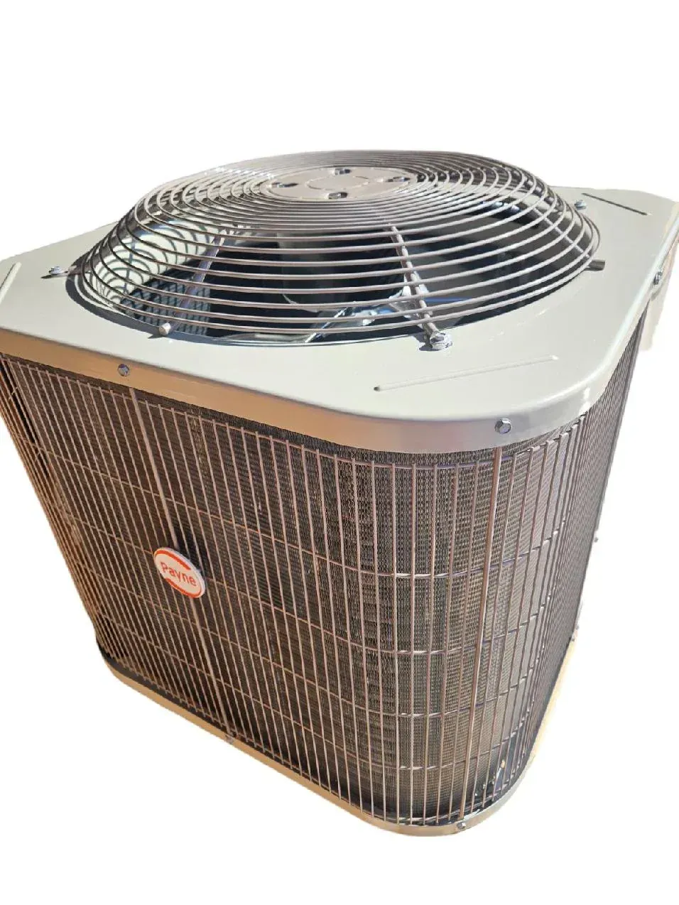 A large air conditioner with a fan on top of it on a white background.