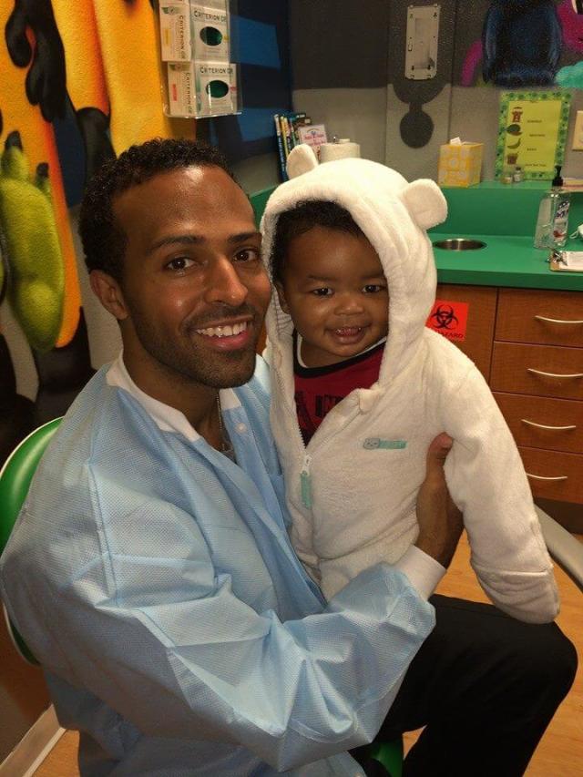 Check-up — Guy Holding Baby in San Antonio, TX