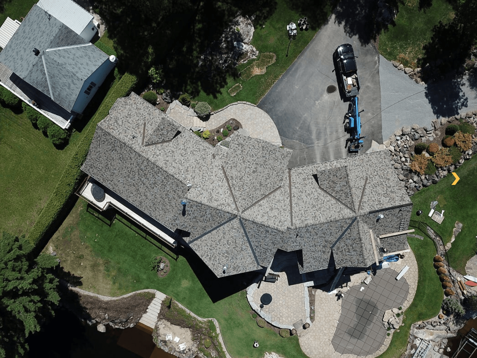 birds eye view of large grey mansion