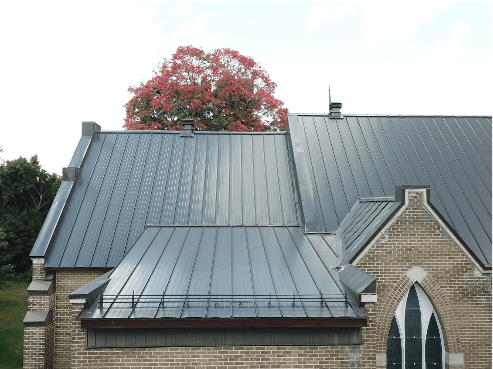 black metal hip and valley roofing