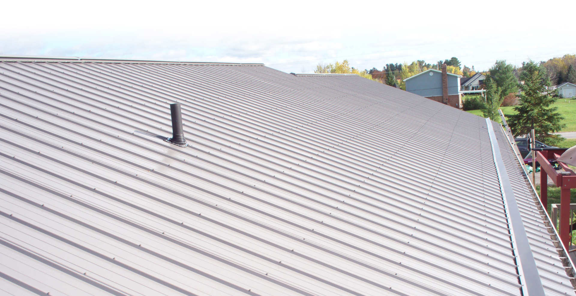 side view of of silver metal roof