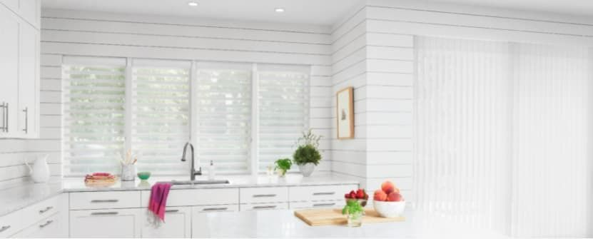 A Kitchen With White Cabinets, a Sink, and a Large Window — Simply Smarter Blinds in Tea Gardens, NSW