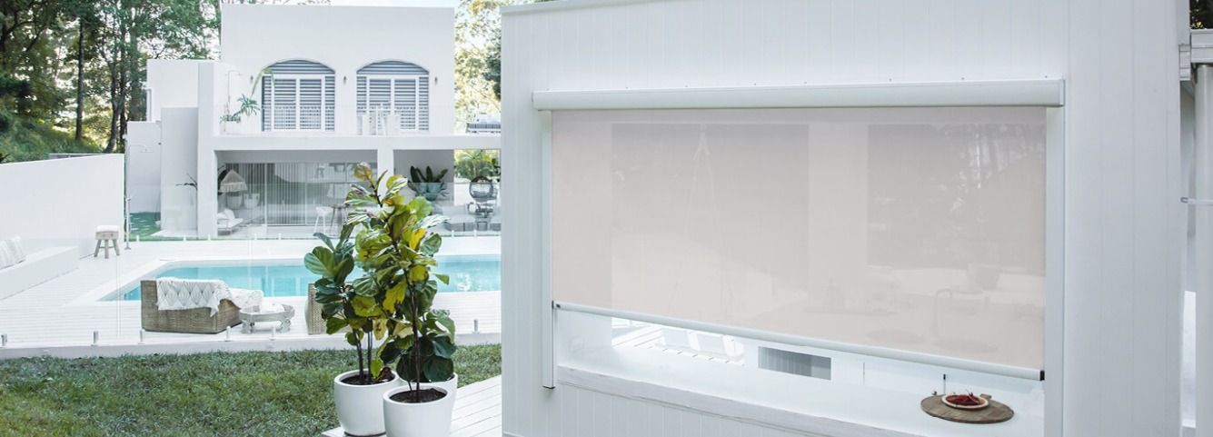 A White House With a Swimming Pool in the Backyard — Simply Smarter Blinds in Tea Gardens, NSW