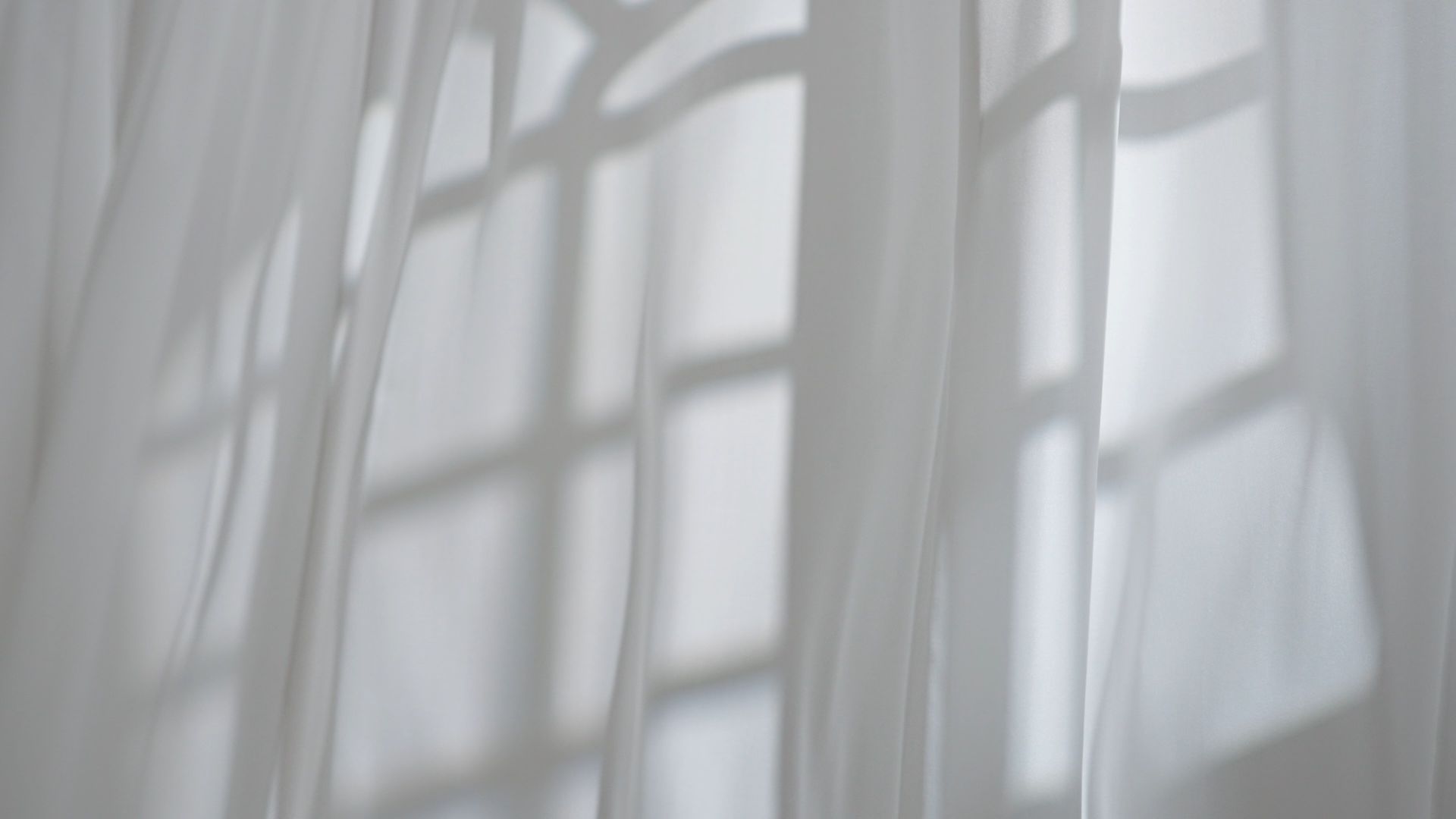 The Shadow of a Window is Cast on a White Curtain — Simply Smarter Blinds in Tea Gardens, NSW