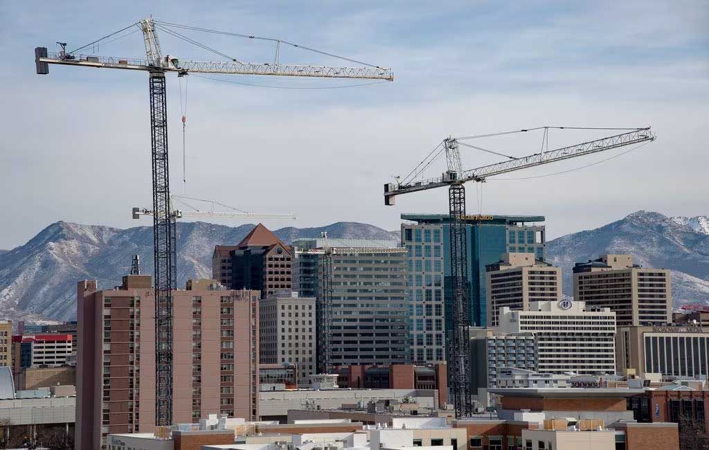 Commercial Buildings With The Cranes — Salt Lake City, UT — Insulation From Hale