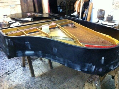 riparazione pianoforte a coda