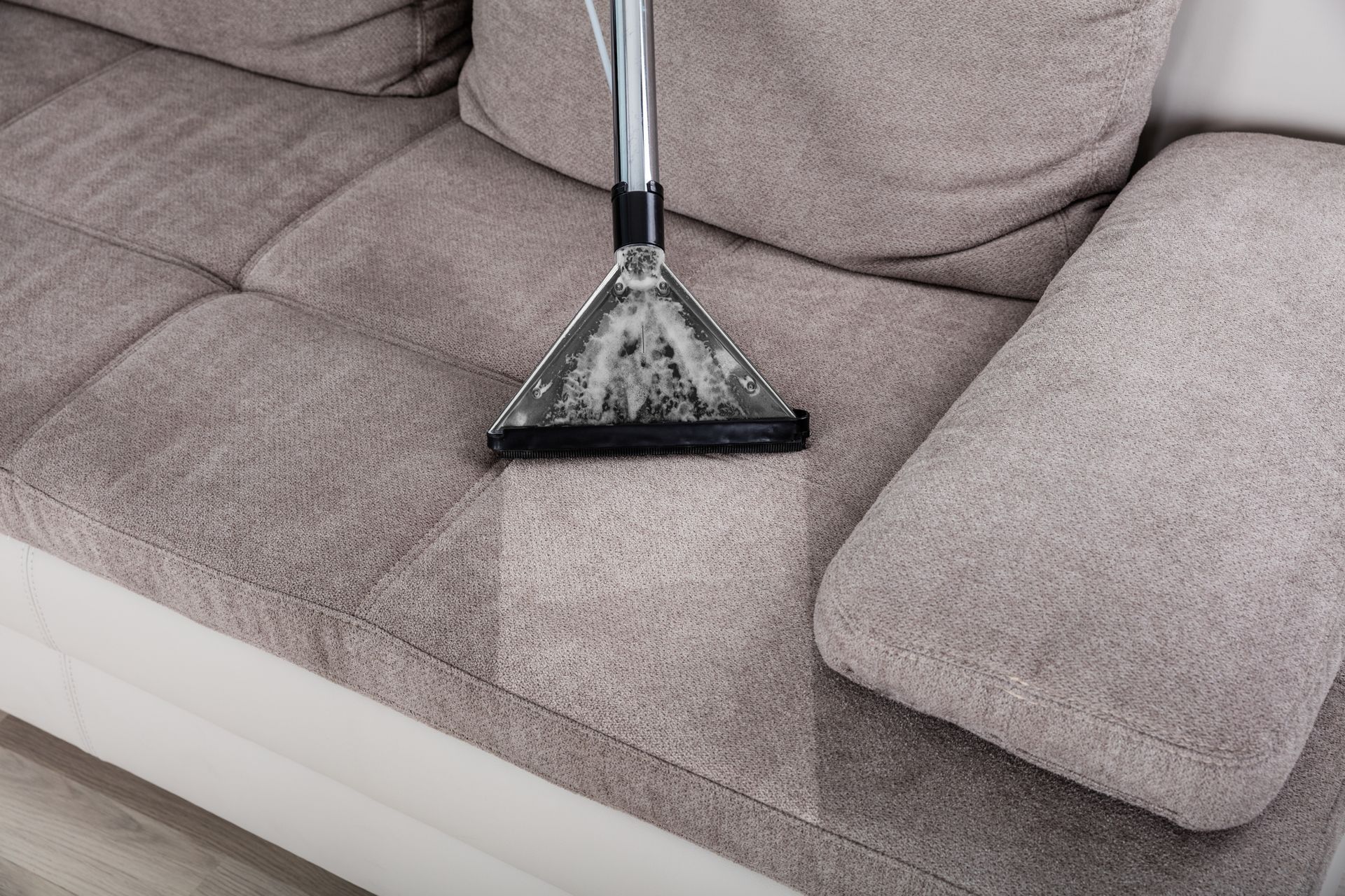 Cleaning Sofa With Vacuum Cleaner — Wodonga, VIC — Frank’s Carpet Cleaning