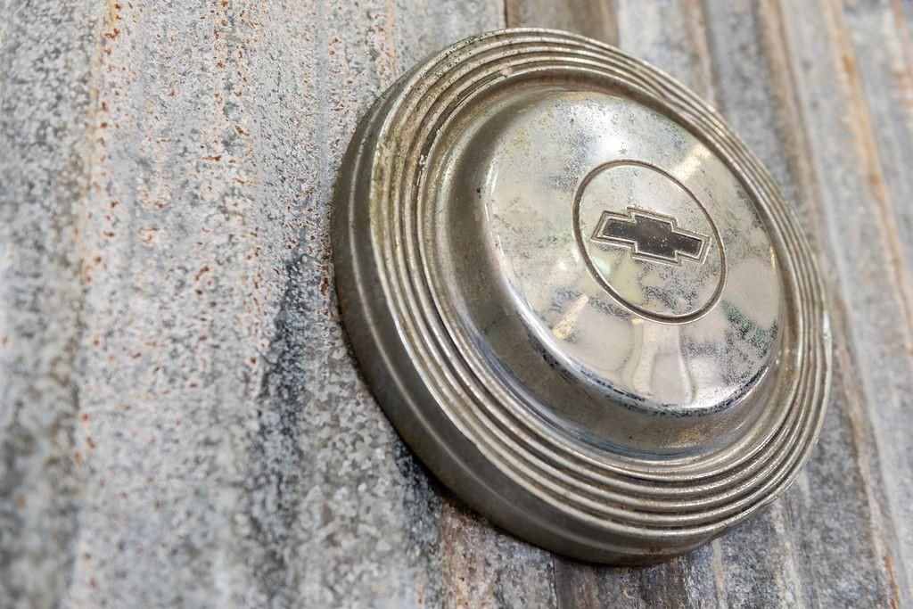 A close up of a clock on a wall.