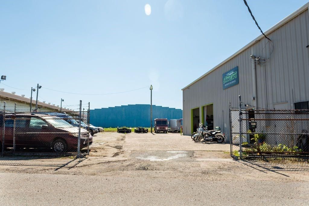 A building with a sign that says ' a & r ' on it