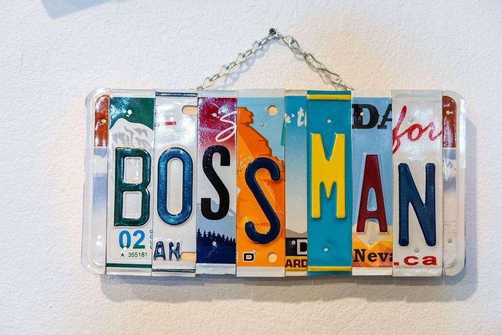 A license plate that says boss man on it