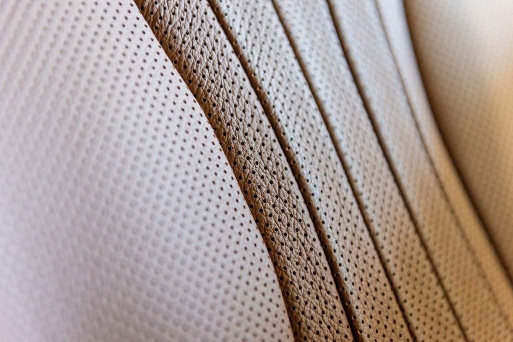 A close up of a piece of fabric with holes in it.