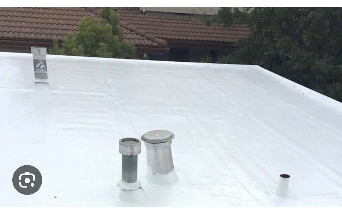 A Man Repair Flat Roof — Spring Hill, FL — Amazing Home Contractors Inc.
