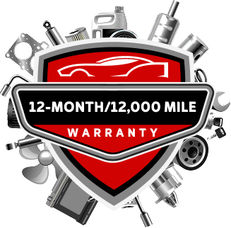 Auto repair shop with red and white exterior, three garage bays, and a small office under a blue sky.