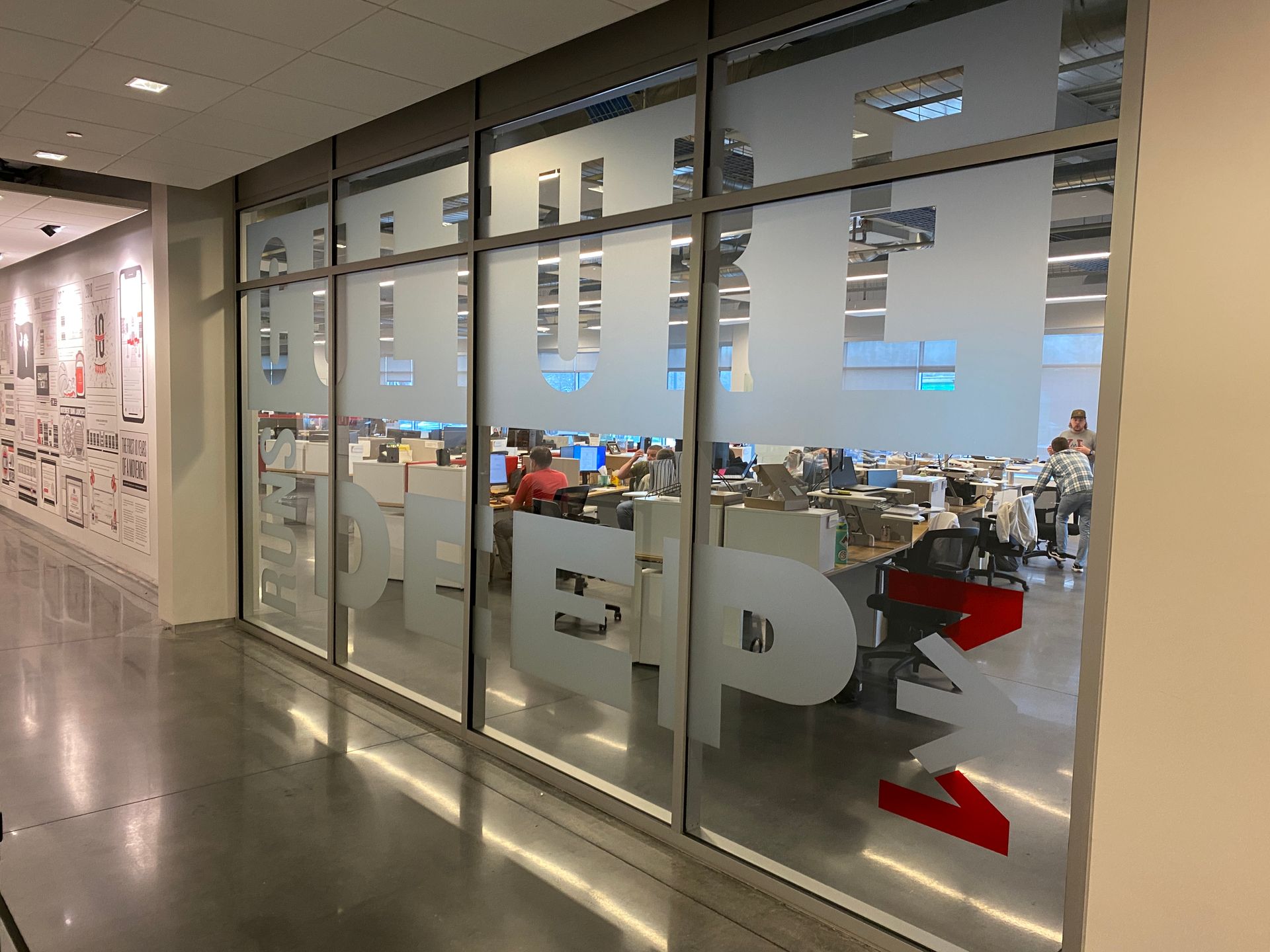 Glass office front with frosted lettering: 