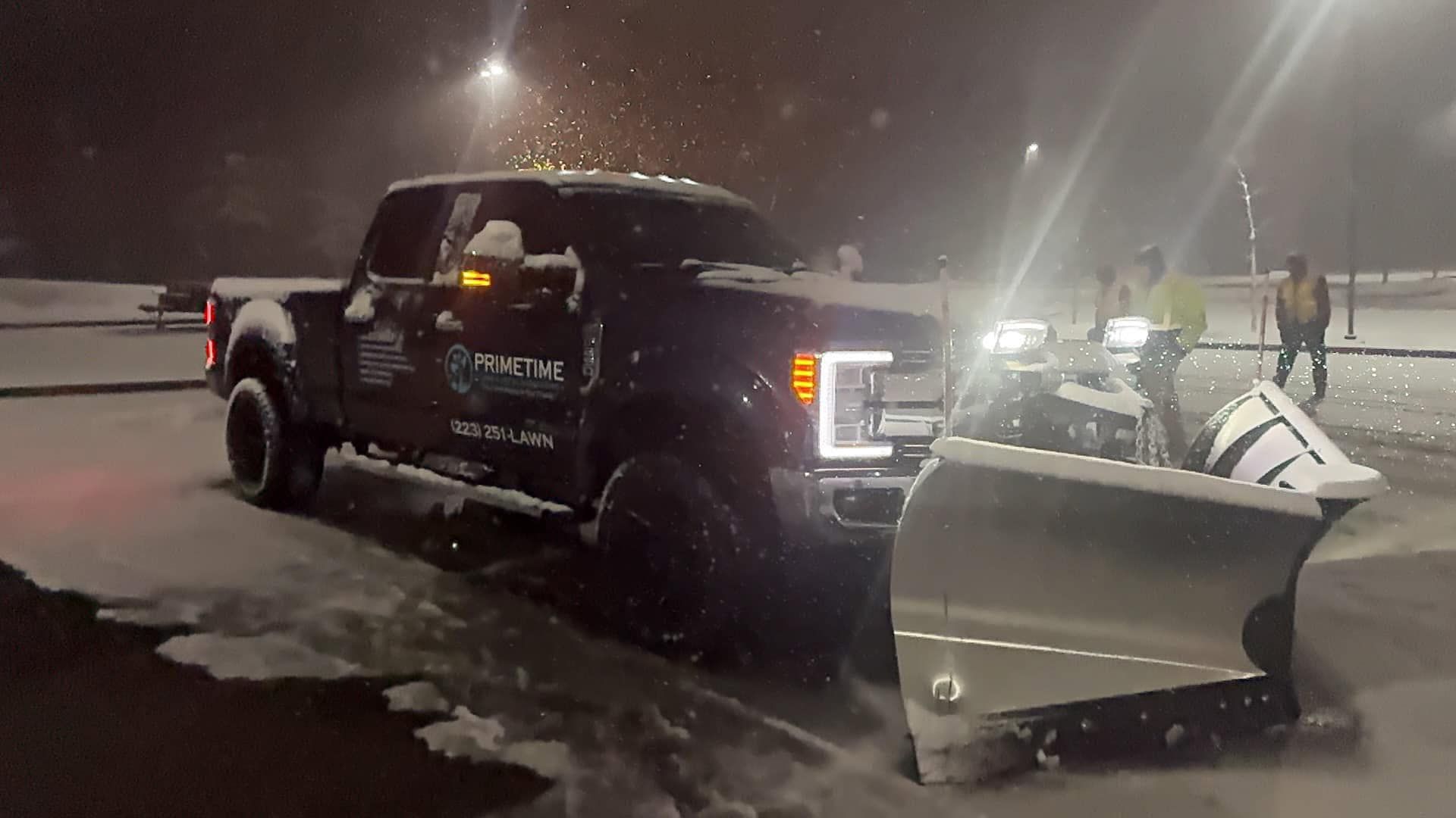 PRIMETIME lawn care and landscaping snowplow truck