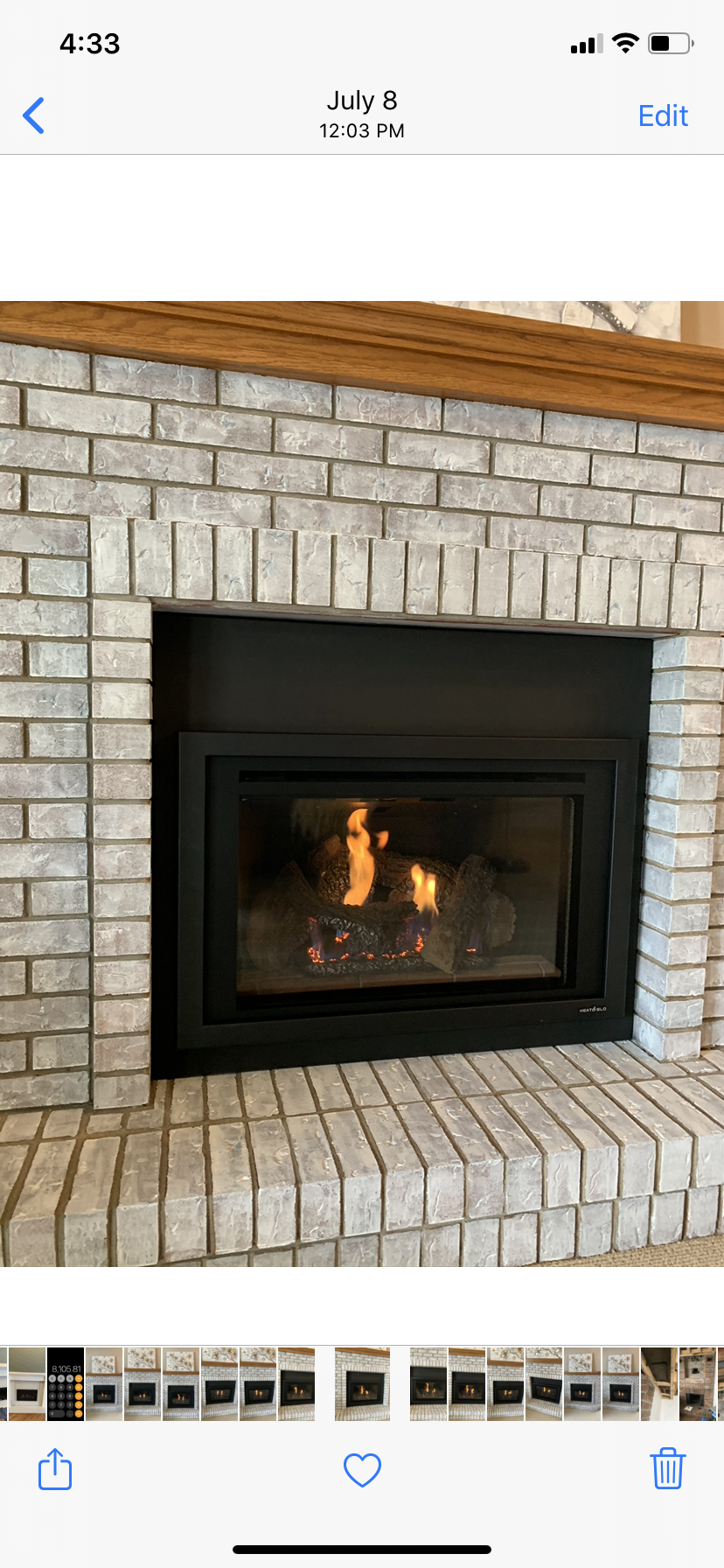 There is a fireplace in the middle of the room.