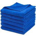A stack of blue towels on a white background
