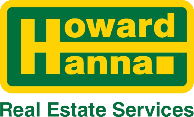 The logo for nancy paterson real estate is a blue circle with the name nancy paterson written inside of it.