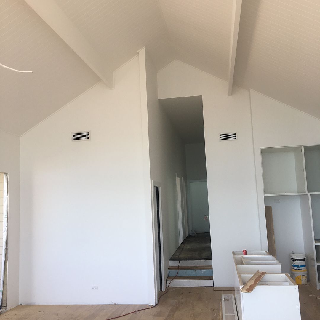 An Empty Room With White Plastered Walls — MC Plastering In Fingal Bay, NSW