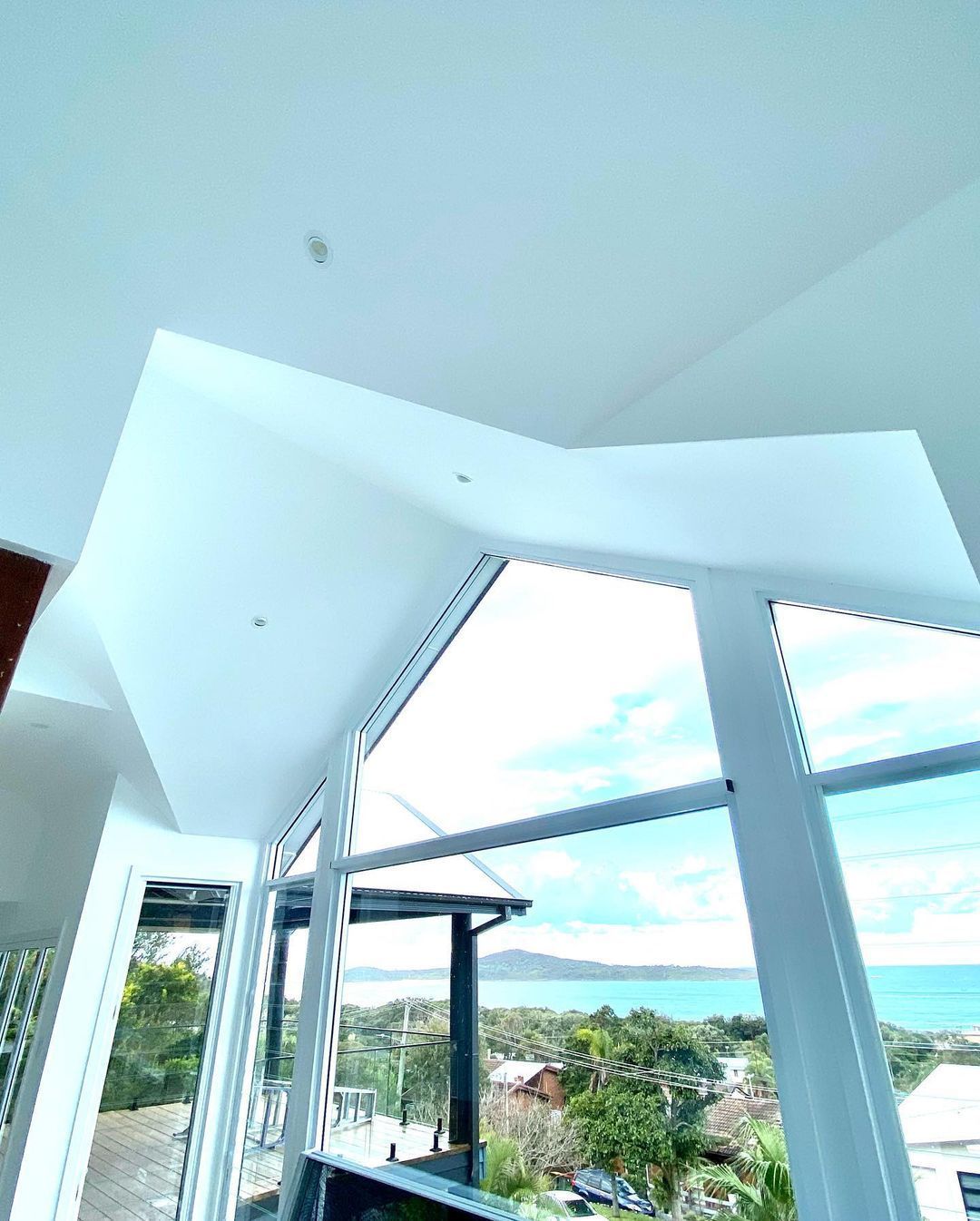 A Huge Window With Plastered Walls And Ceiling — MC Plastering In Fingal Bay, NSW