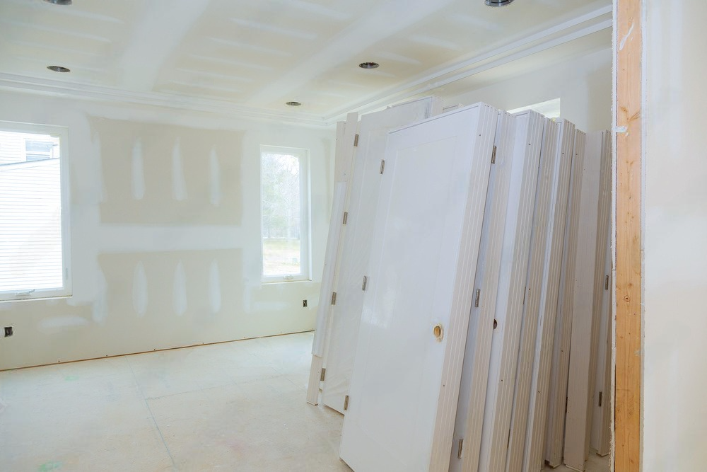 a stack of gypsum walls in a room under construction