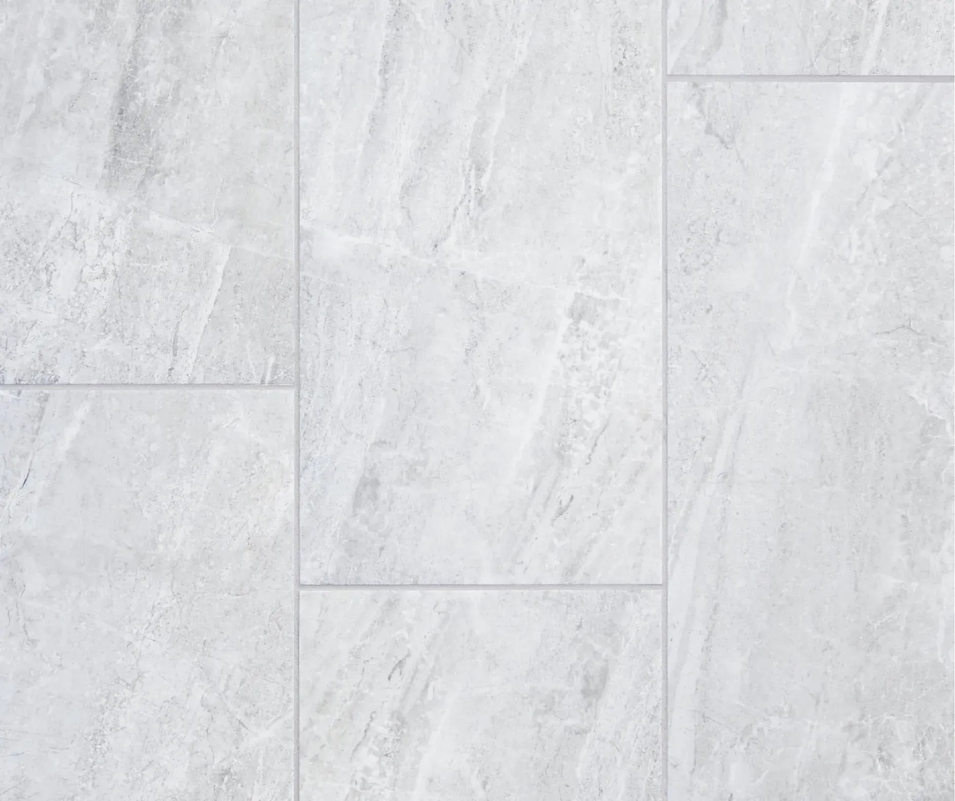 White stone tile floor with a light gray marbled pattern.